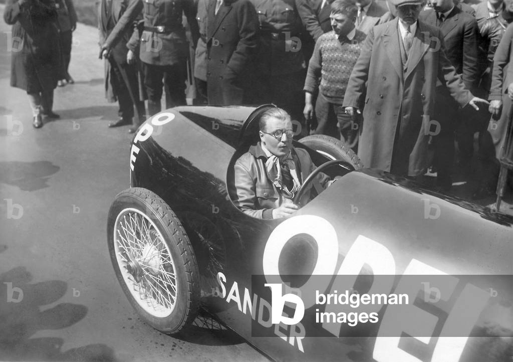 Fritz von Opel in the rocket car, 1928 (b/w photo)
