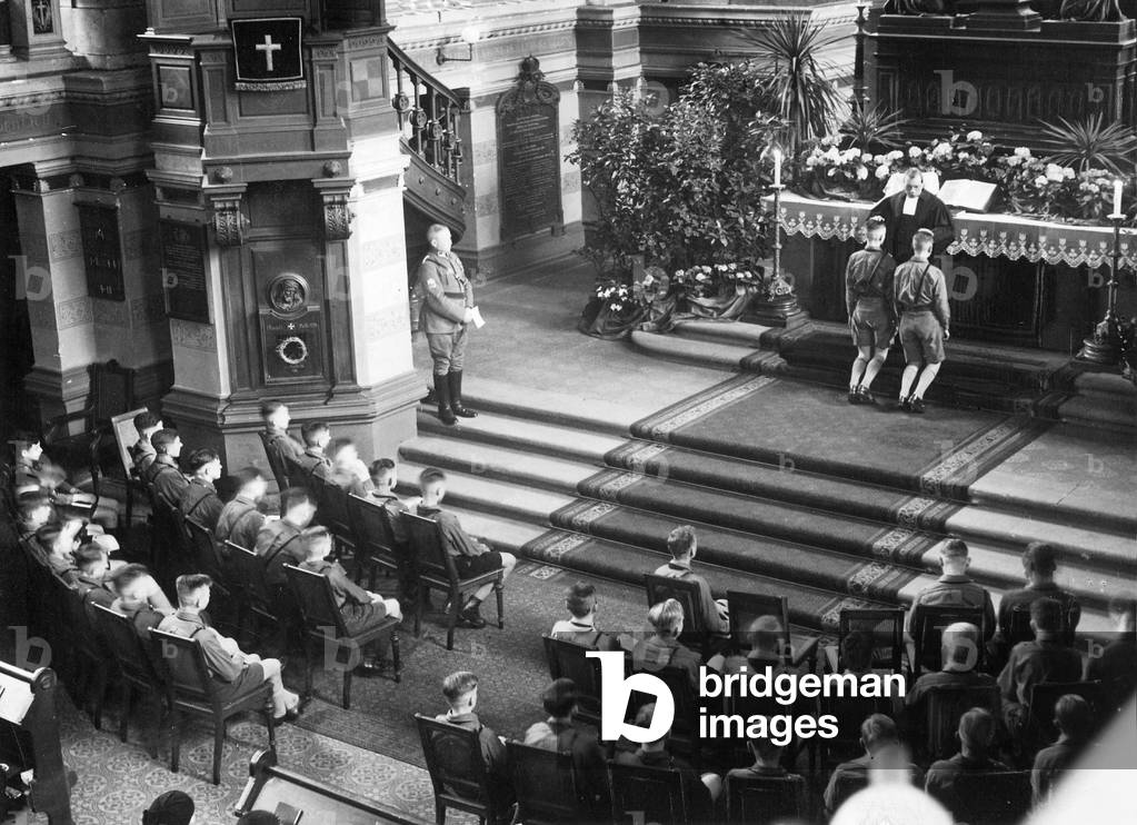 Confirmation of the Hitler Youth in a church in Berlin, 1934 (b/w photo)