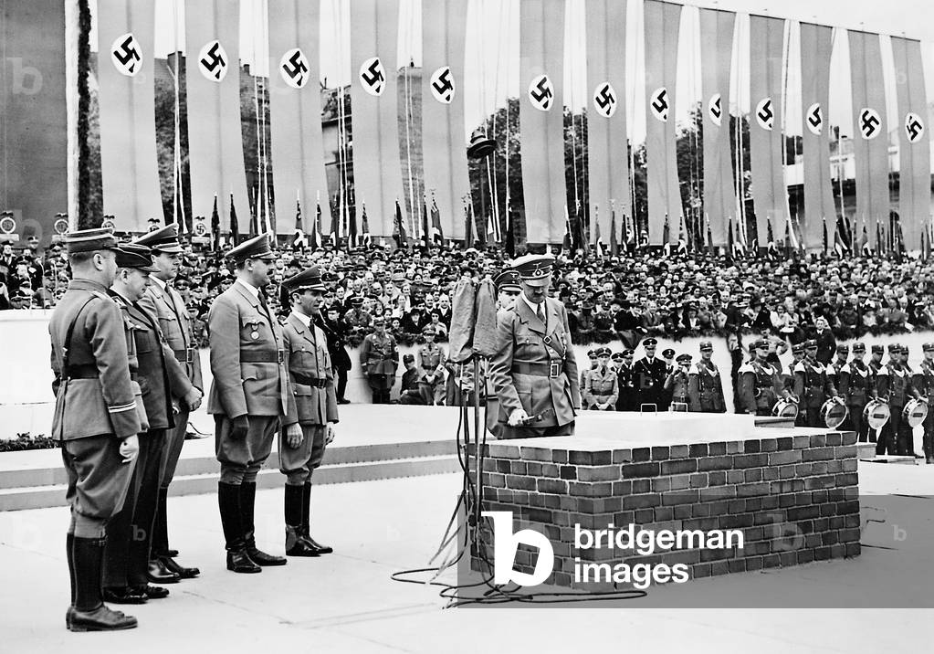 Adolf Hitler at the laying of the foundation stone for the 'House of the German tourism', 1938 (b/w photo)