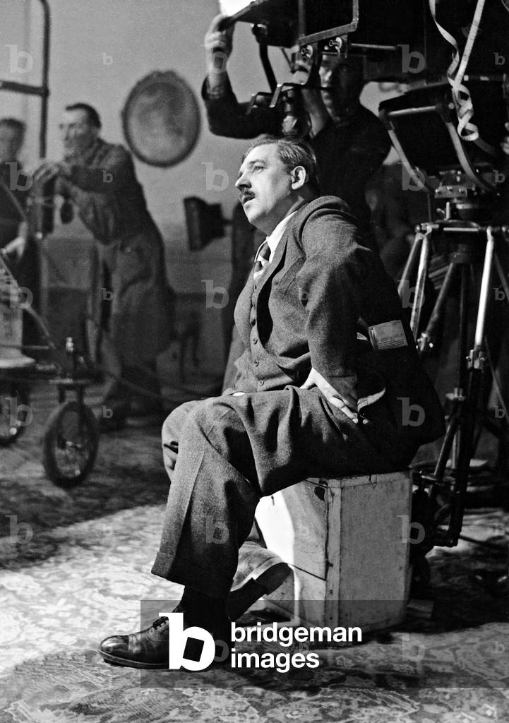 Karl Hartl during the filming of 'Two Merry Adventurers', 1937 (b/w photo)