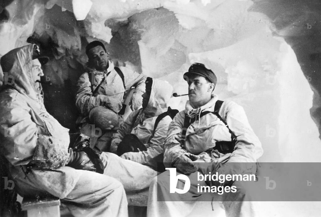 German mountain infantry in an ice cave on the Arctic Ocean front, 1942 (b/w photo)