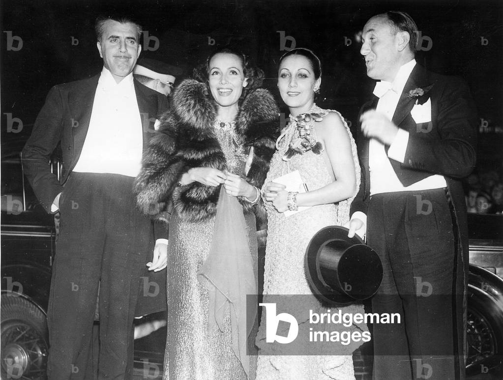 Cedric Gibbons, Dolores Del Rio, Ann Alvarade and Jack Warner, 1936 (b/w photo)