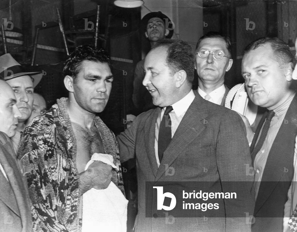 Hans Heinrich Dieckhoff consoles Max Schmeling, 1938 (b/w photo)