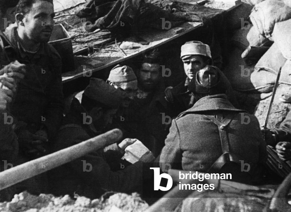 Republican soldiers seek shelter in a trench in Malaga, 1937