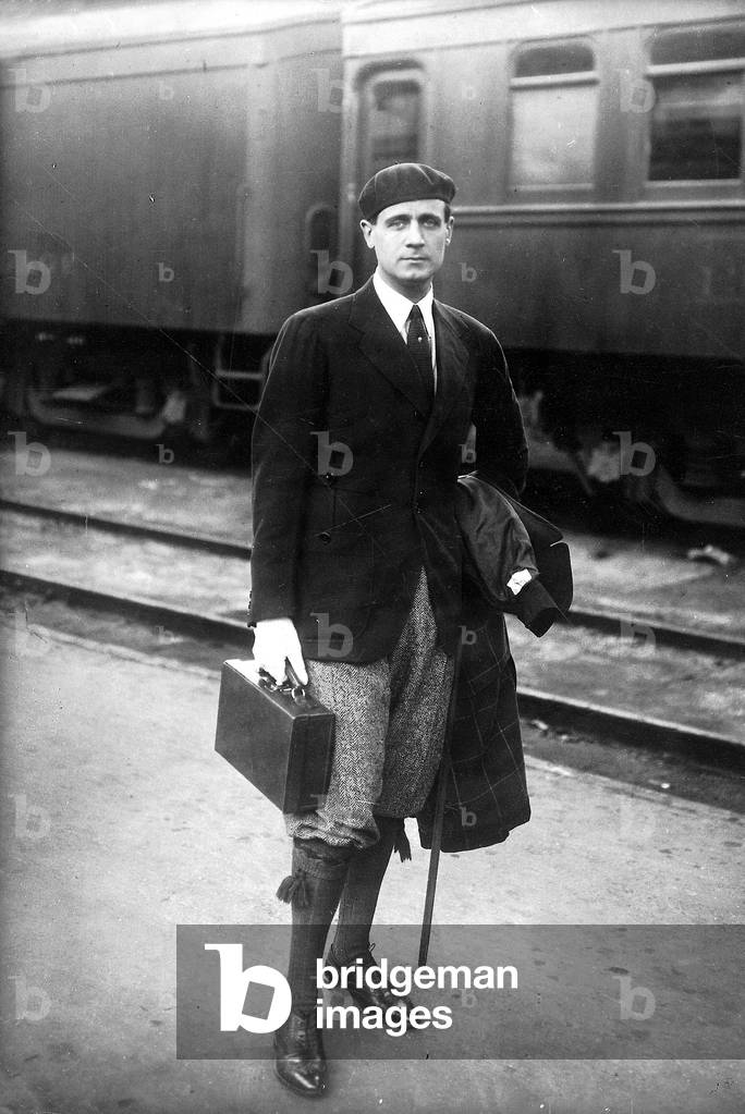 Man in traveling clothes, 1926 (b/w photo)