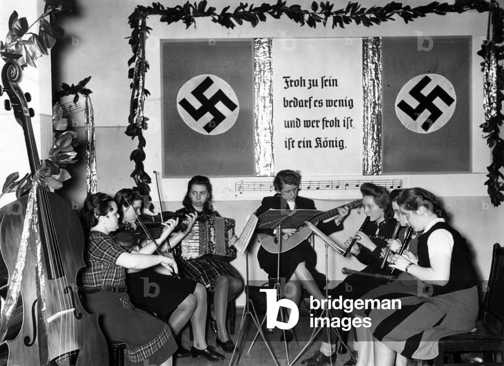 Employees playing music, 1942 (b/w photo)