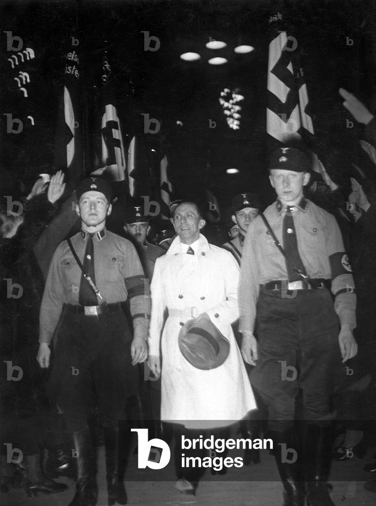 Joseph Goebbels between SS guards, 1934 (b/w photo)