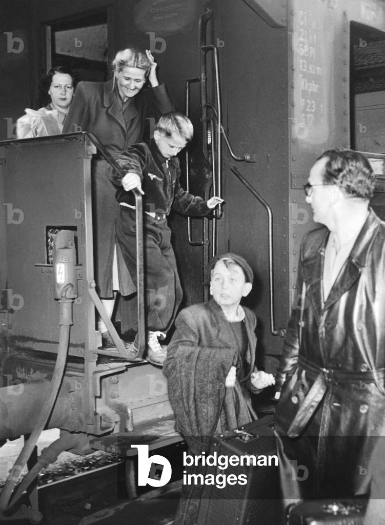 Refugees of the CSSR on a train to Germany  (b/w photo)