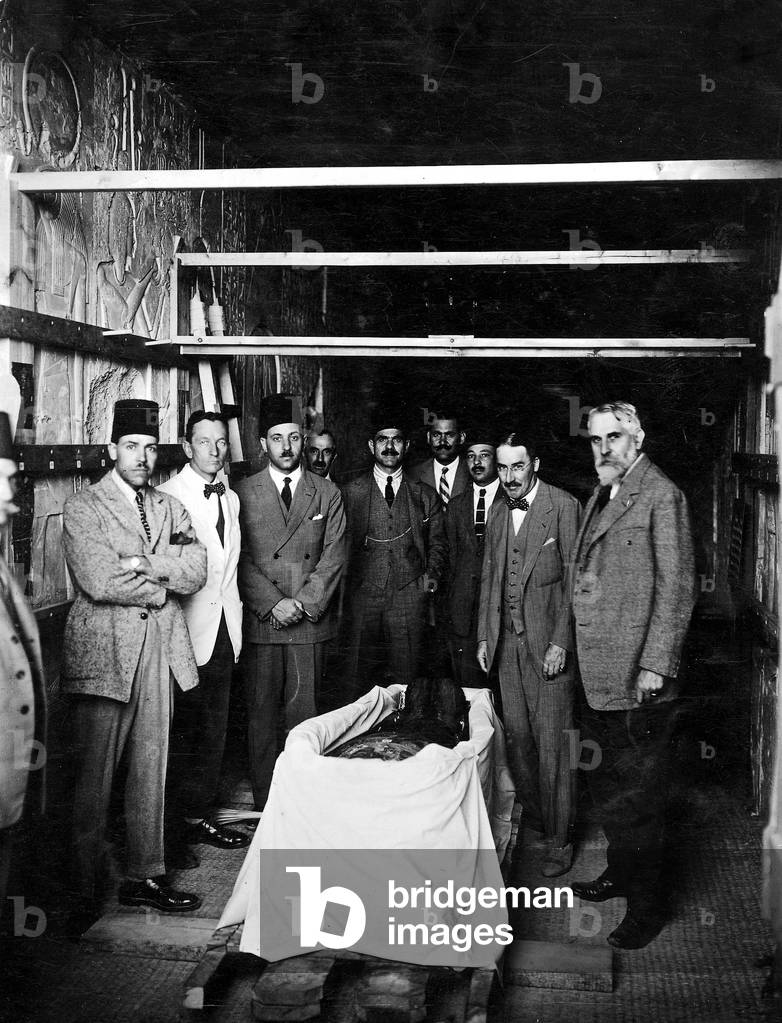 Howard Carter in a royal grave in the Valley of the Kings in Egypt (b/w photo)
