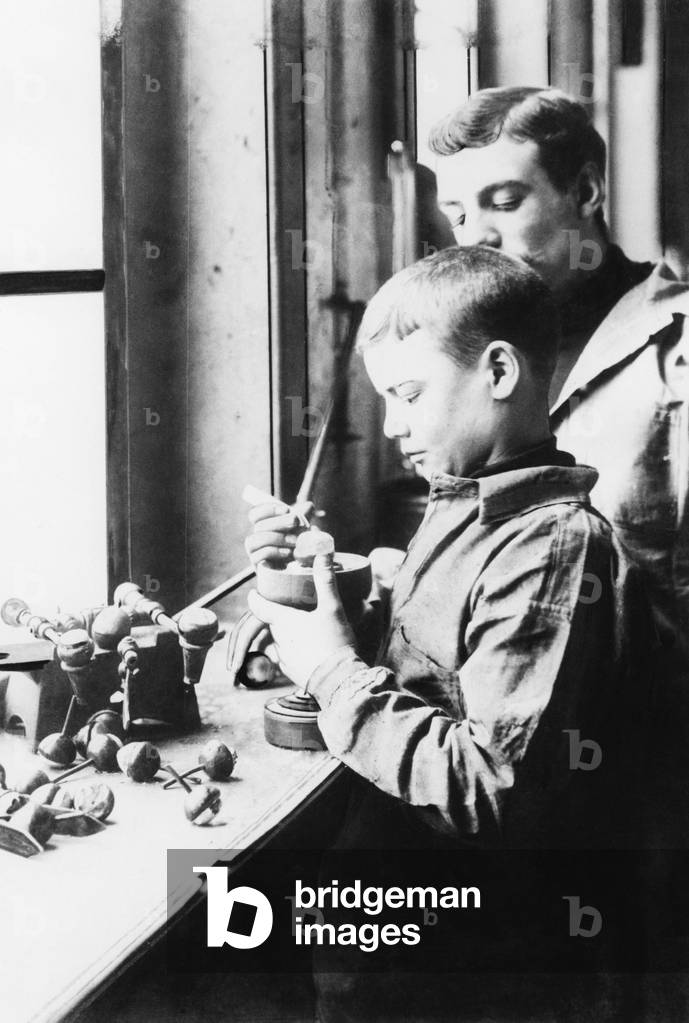 Boy doing preparatory work in a diamond cutting shop , 1904 (b/w photo)