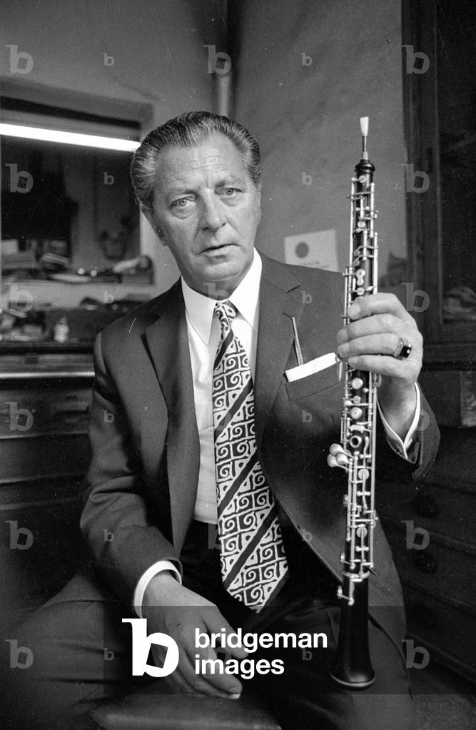 Musician with oboe, 1971 (b/w photo)