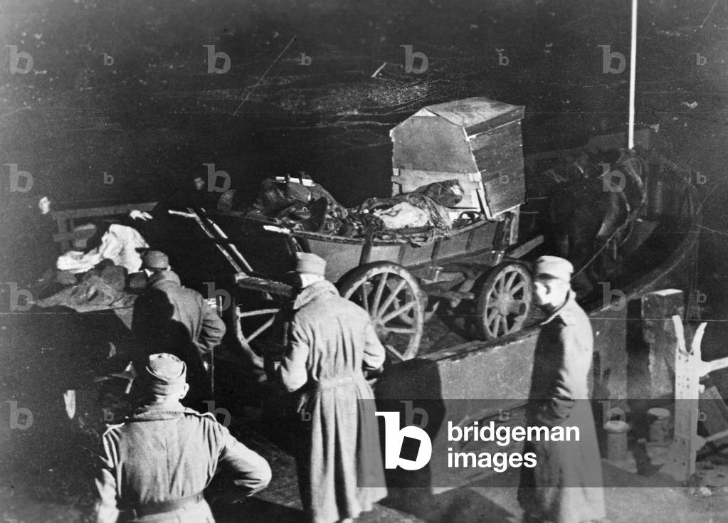 Horse carriage in the night crossing a river in the Netherlands, 1944 (b/w photo)