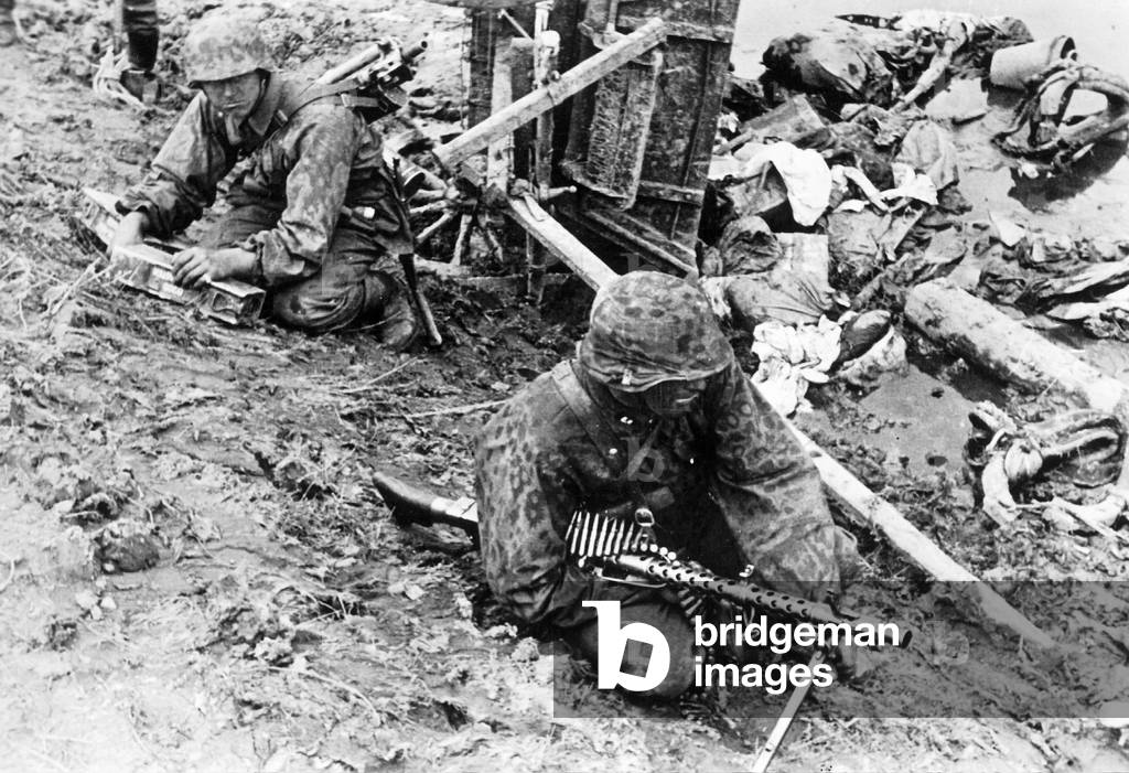Soldiers of the Weapon-SS during a lull in the fighting on the Eastern Front, 1941 (b/w photo)