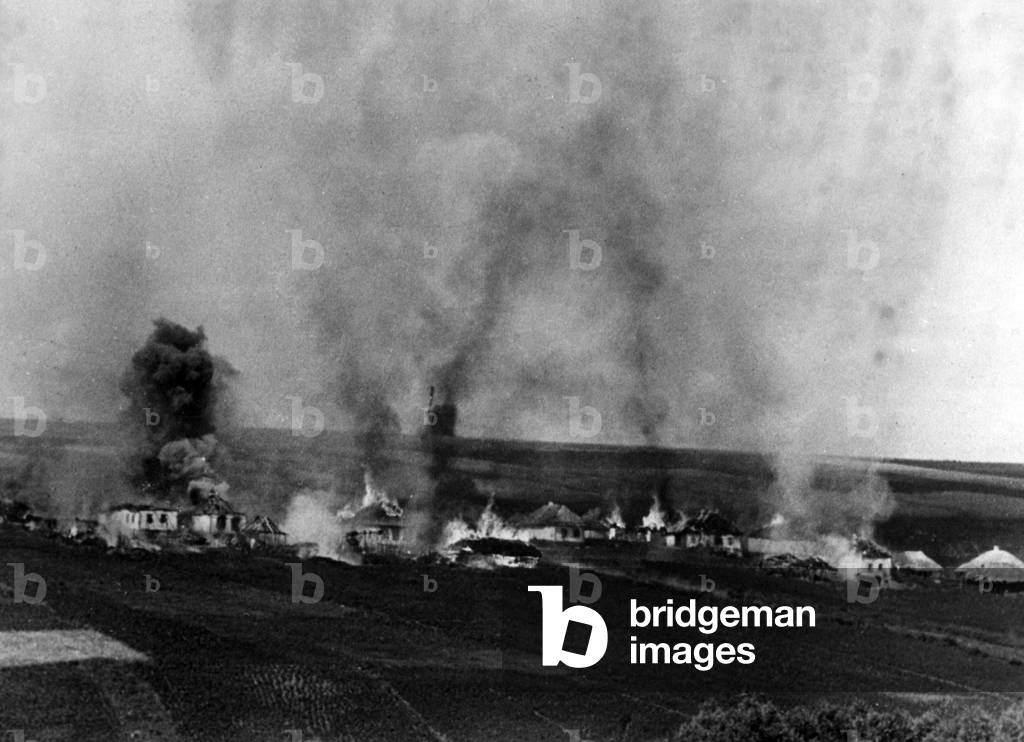 A burning village during Operation Citadel, 5th July 1943 (b/w photo)