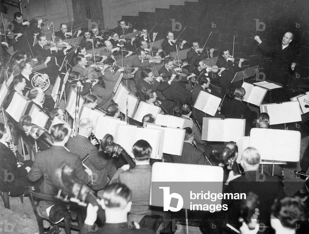 Orchestra rehearsal of the Berlin Philharmonic Orchestra conducted by Wilhelm Furtwaengler, 1938 (b/w photo)
