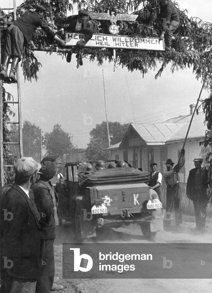 Russian population greets German soldiers of the Army Group South, 1941 (b/w photo)