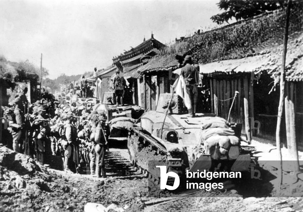Japanese tanks and soldiers during battles against British troops, Peninsula of Malaya, 1942 (b/w photo)