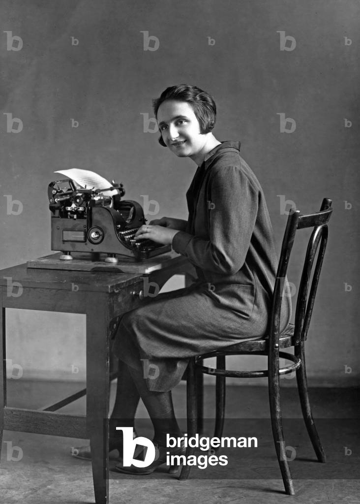 Office employee, 1925 (b/w photo)