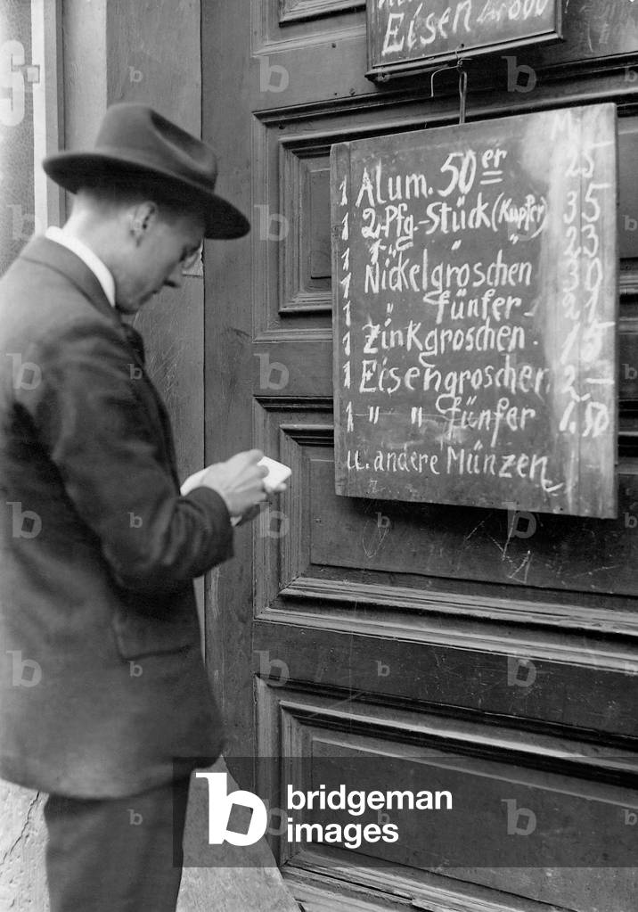 Coins as commodity, 1923 (b/w photo)