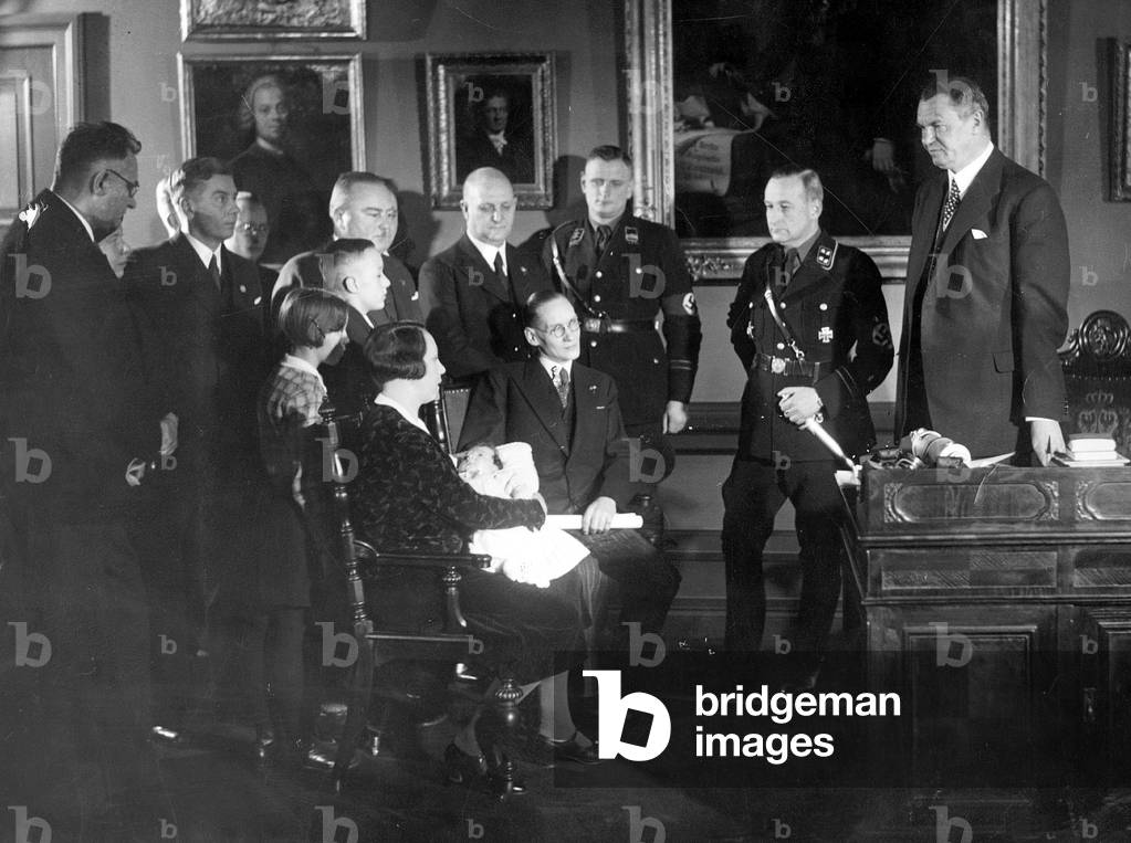 Honoring a family with many children, 1935 (b/w photo)