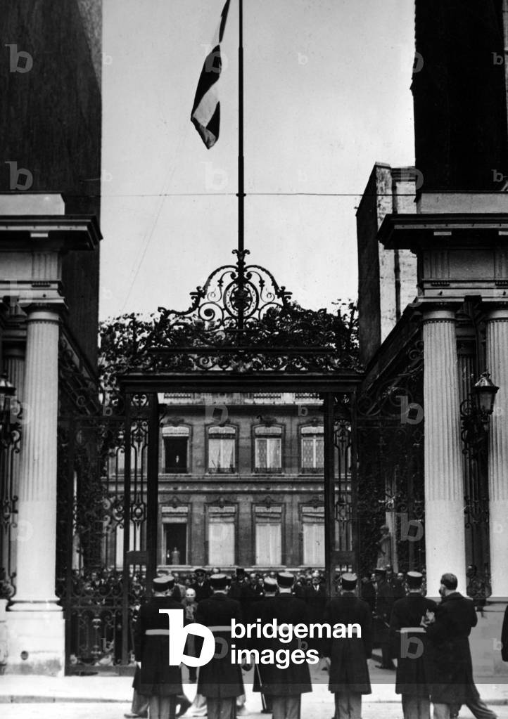 Flag hoisting at the French Ministry of the Interior, 1942 (b/w photo)