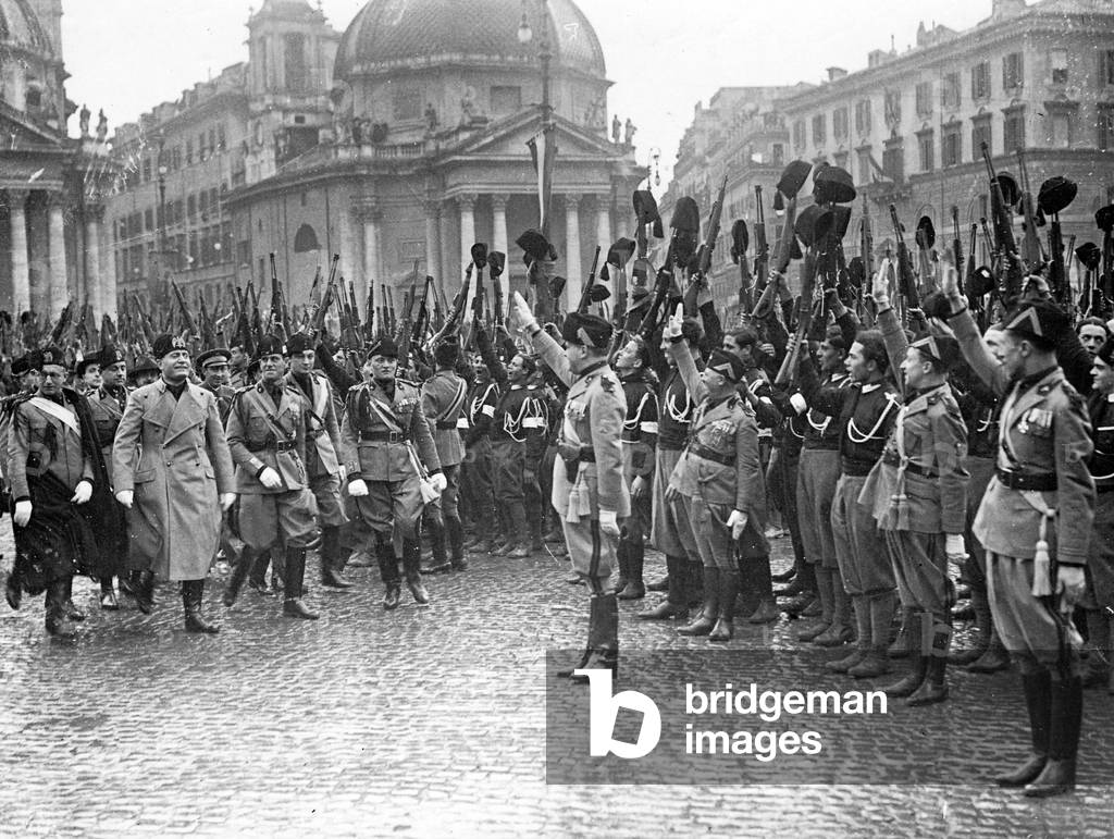 Benito Mussolini is saluted by Militia groups , 1928 (b/w photo)
