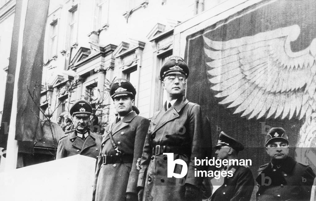 Hans Frank and Arthur Seyss-Inquart at a parade in Krakow, 1941 (b/w photo)