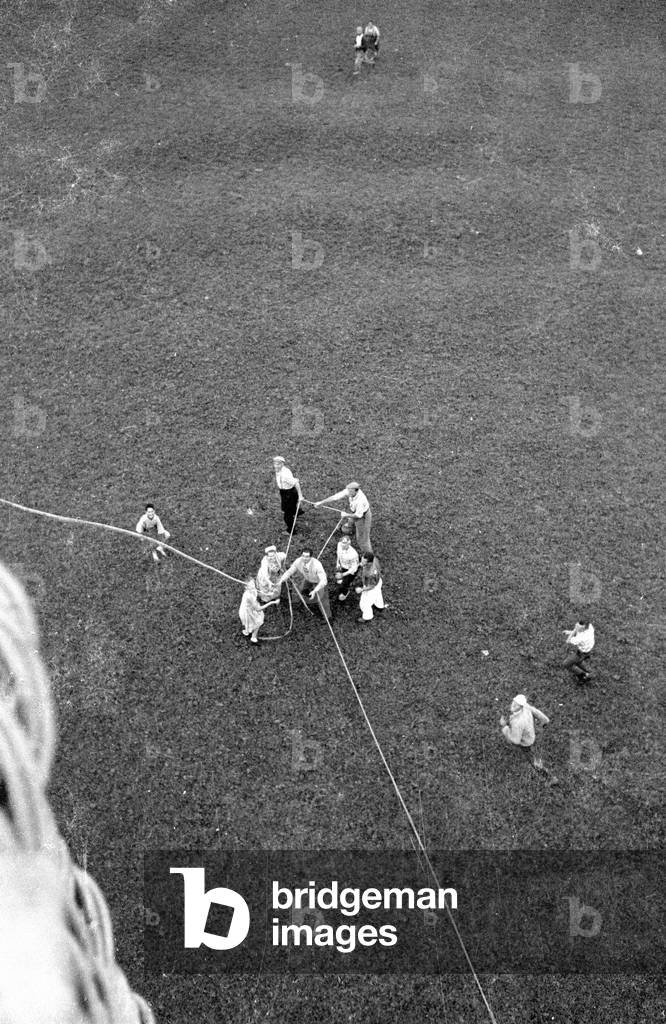 Hot air balloon landing, 1959 (b/w photo)