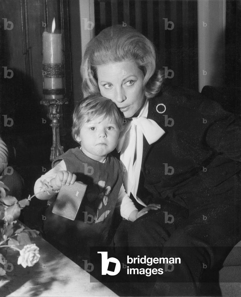 Mother with daughter, 1950s (b/w photo)