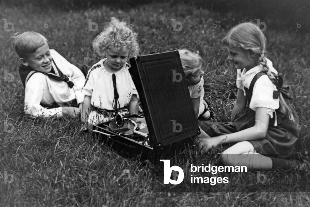 Children play with a gramophone, 1930