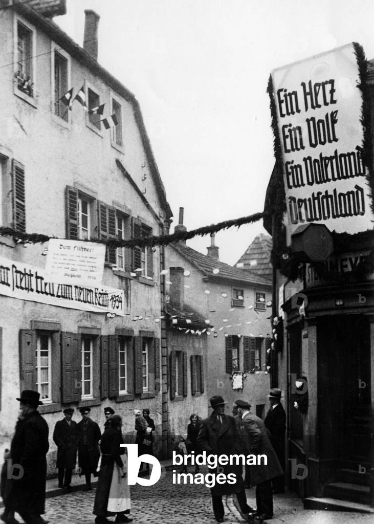 Celebration of the first anniversary of the seizure of power in Saarbruecken, 1934 (b/w photo)