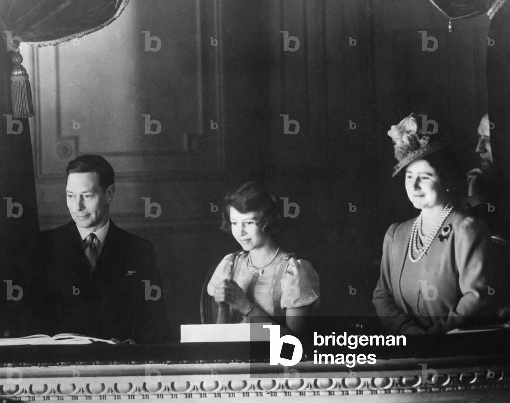 Elizabeth II with her parents at the Coliseum, 1939 (b/w photo)