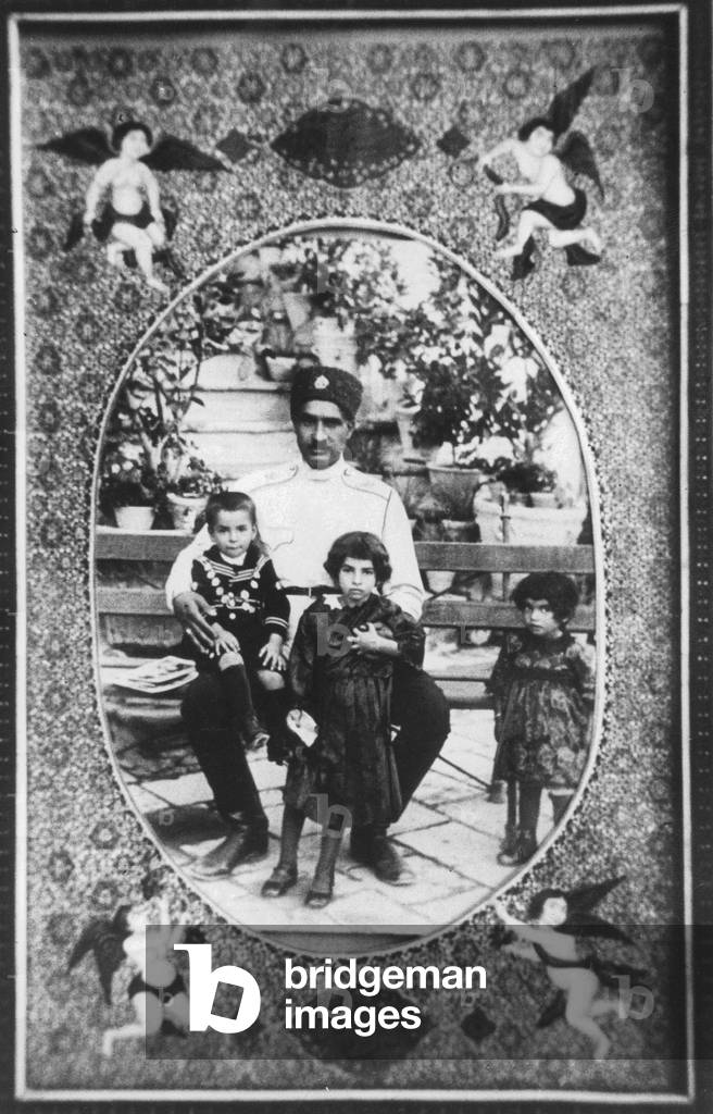 The Shah of Iran, Reza Pahlavi I with three children (b/w photo)