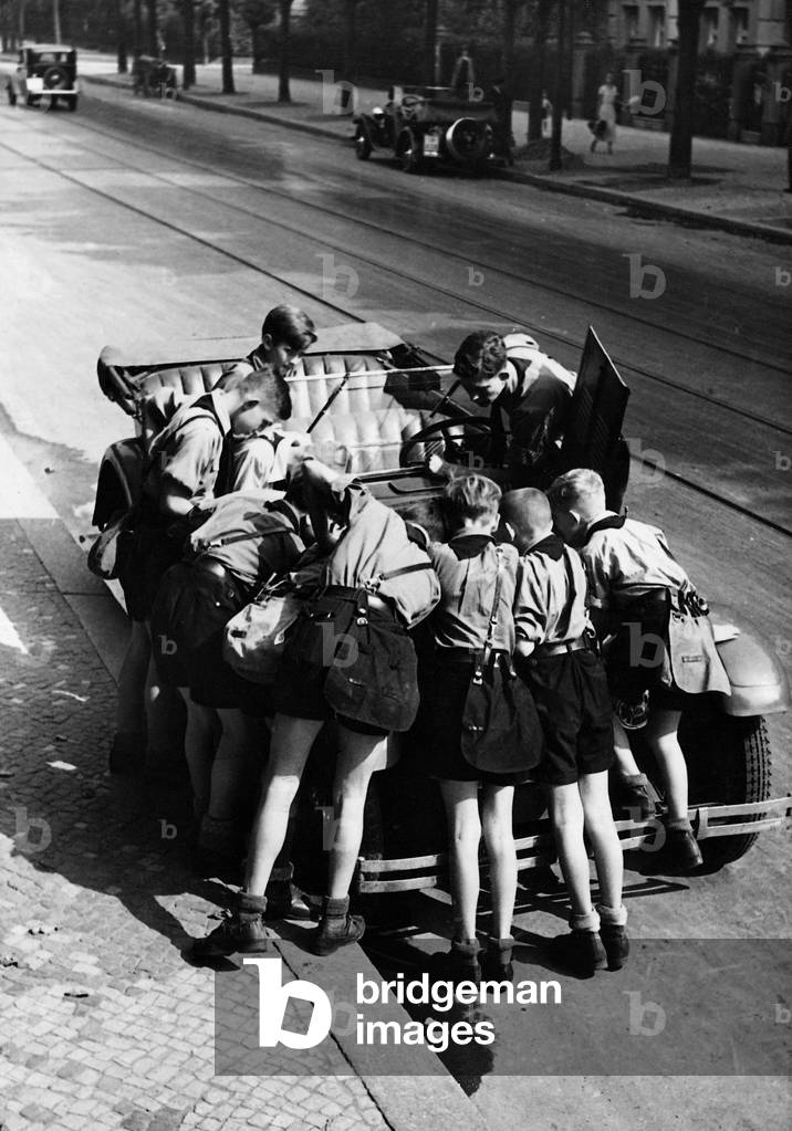 Curious Children inspect a car, 1935 (b/w photo)