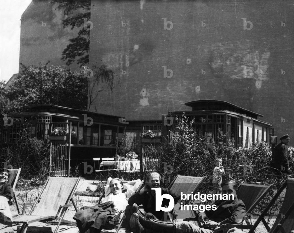 Unemployed in front of converted tram cars, 1932
