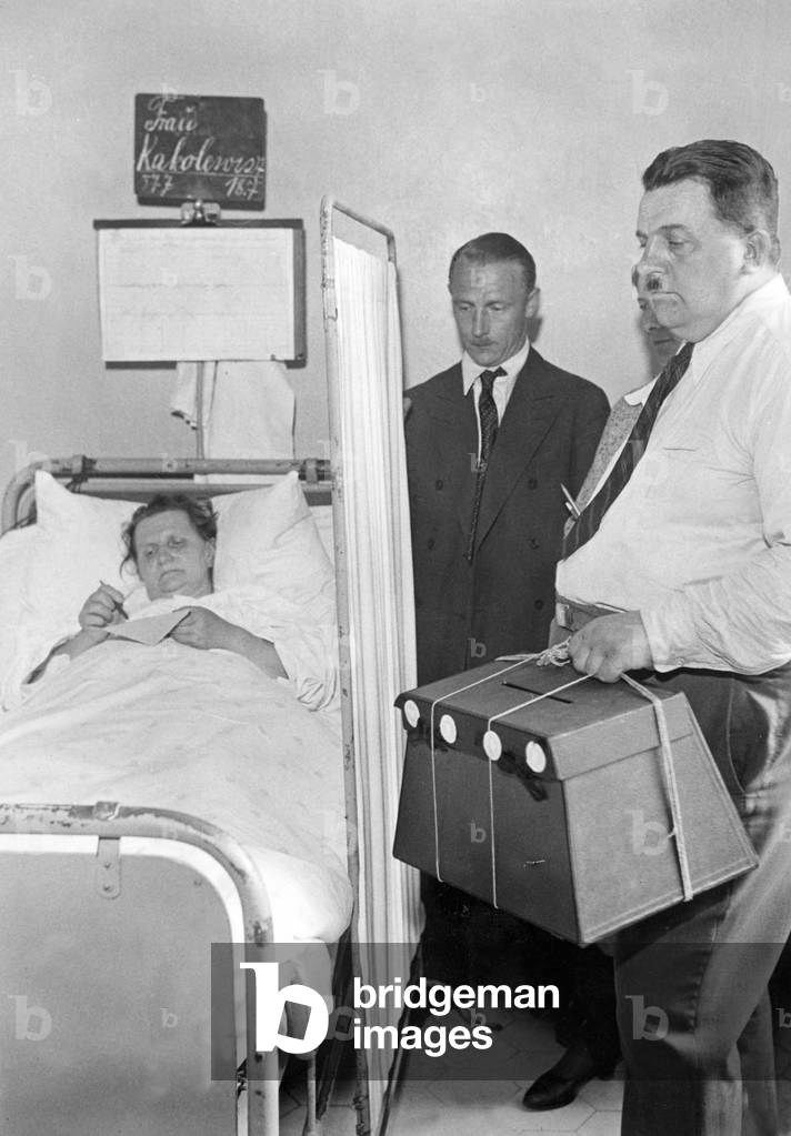 Voting in a hospital bed, 1932