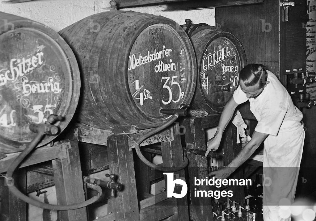 Heurigen wine barrels in Vienna, 1937 (b/w photo)