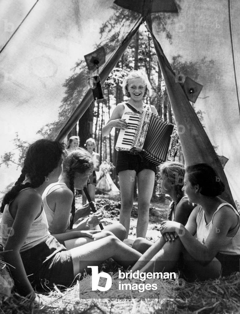 German Jungmaedel (Young Girls) making music in the holiday camp, 1938 (b/w photo)