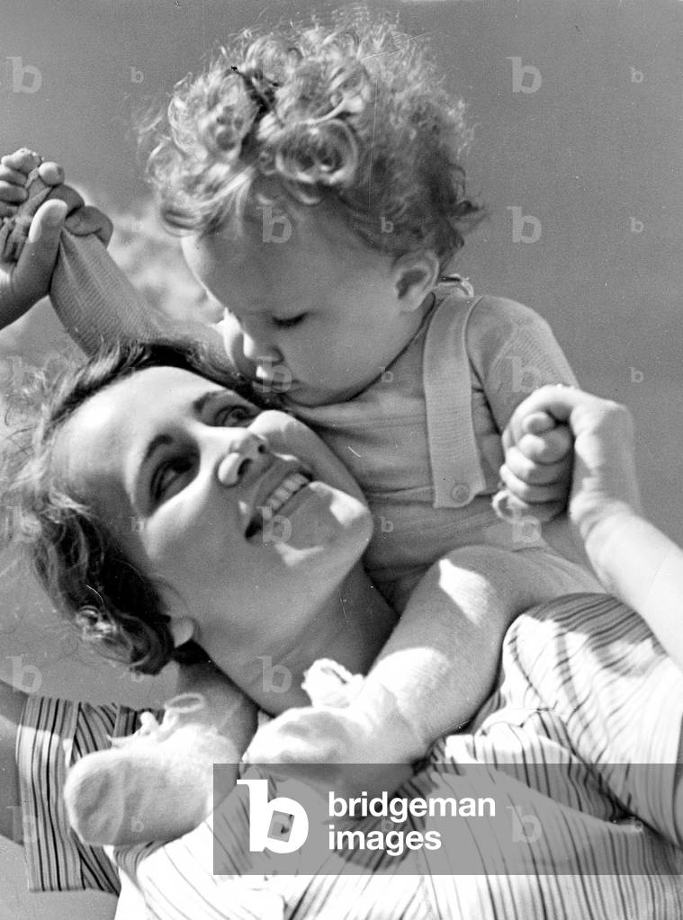 Mother and child, 1938 (b/w photo)