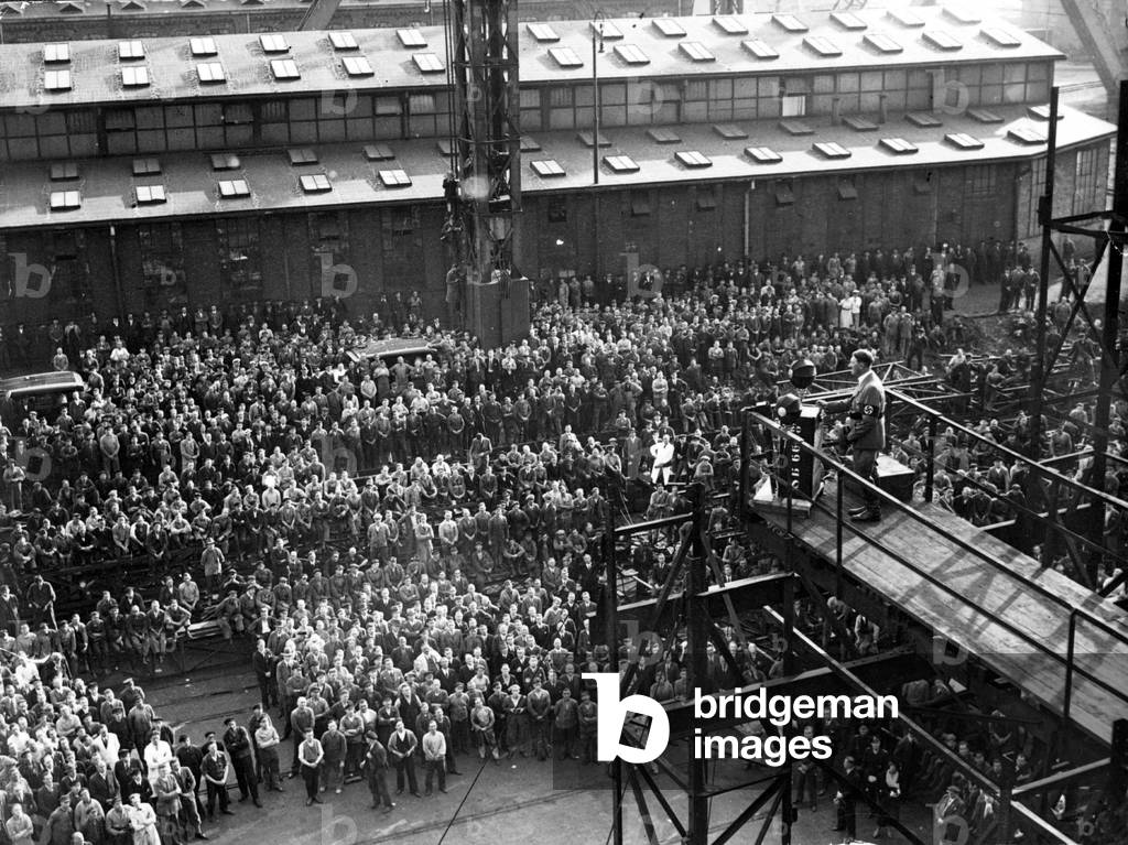 Adolf Hitler during a speech to workers of the Blohm and Voss shipyard, 1935 (b/w photo)