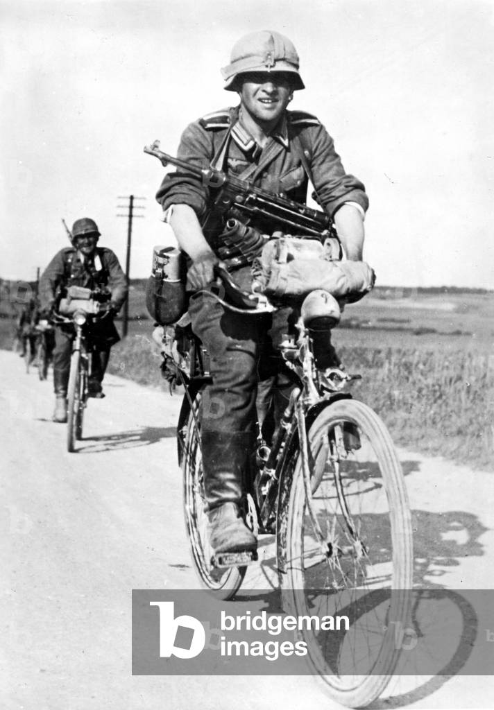 German soldier on a bicycle, 1941 (b/w photo)