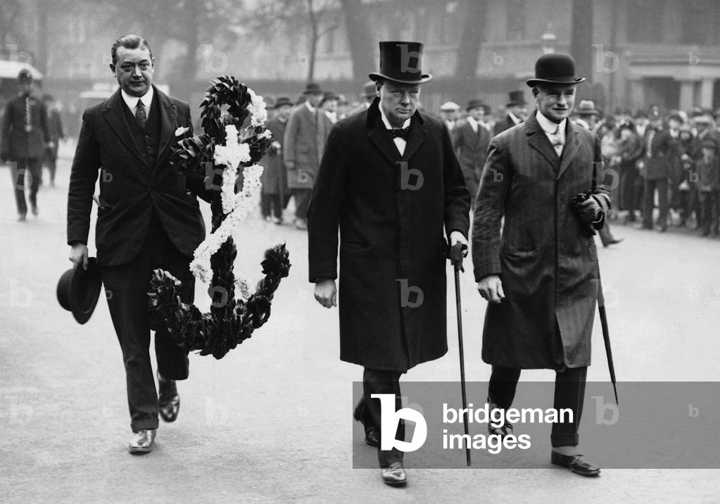 Winston Churchill on his way to a wreath-laying ceremony, 1927 (b/w photo)