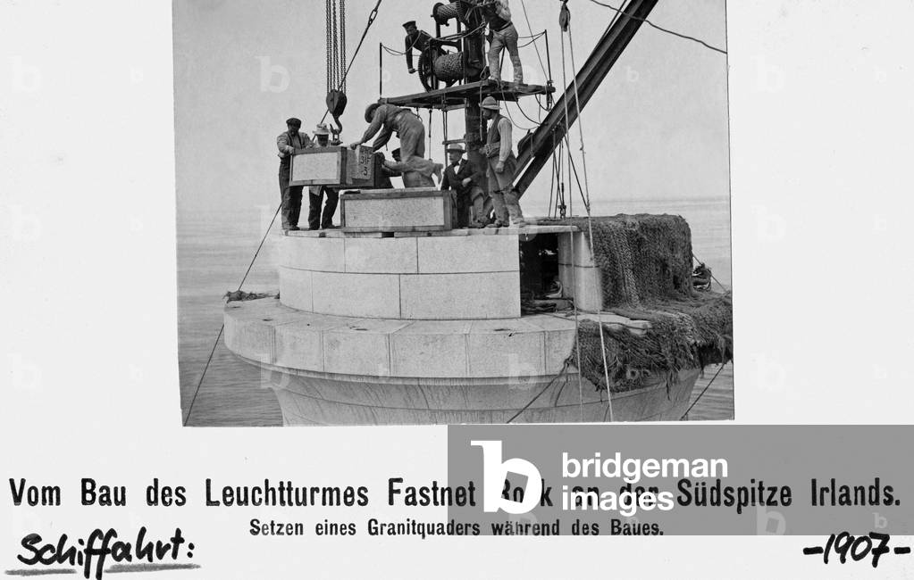 Construction of the lighthouse Fastnet Rock at the southern tip of Ireland, 1907 (b/w photo)