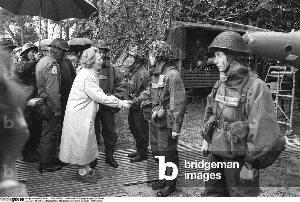 Margaret Thatcher with soldiers, 1986 (b/w photo)