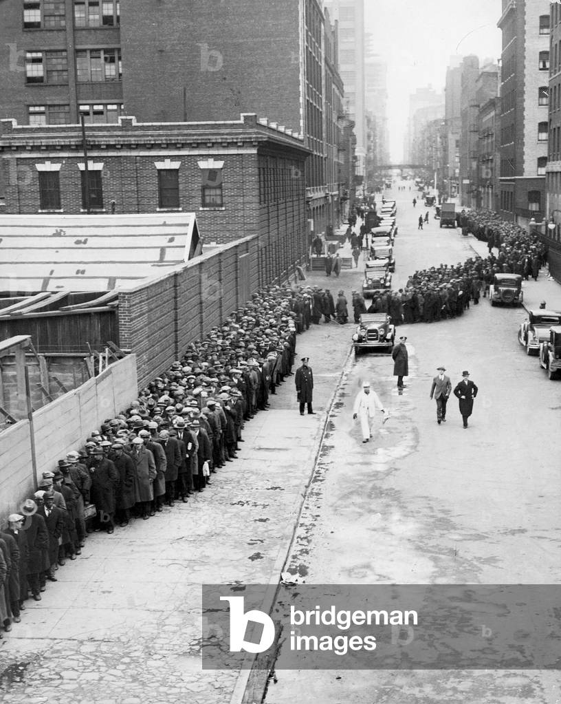 Unemployed queue for a job, 1932 (b/w photo)
