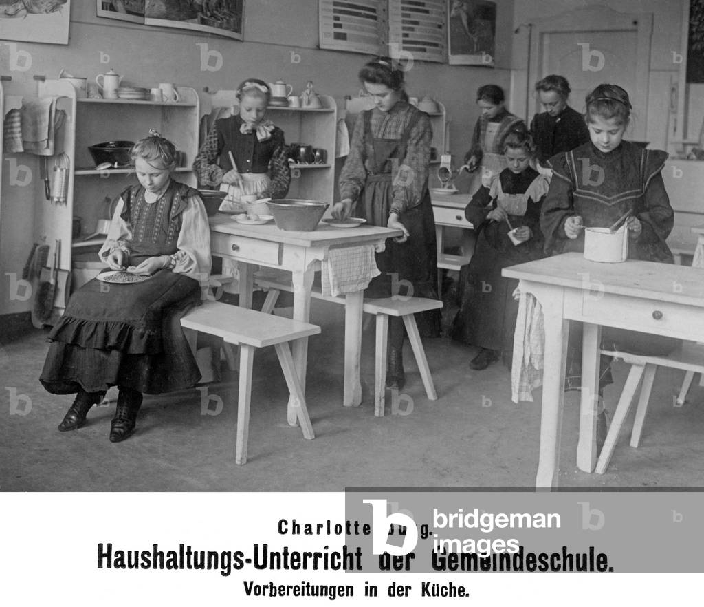 Home economics lessons in a community school, 1905 (b/w photo)