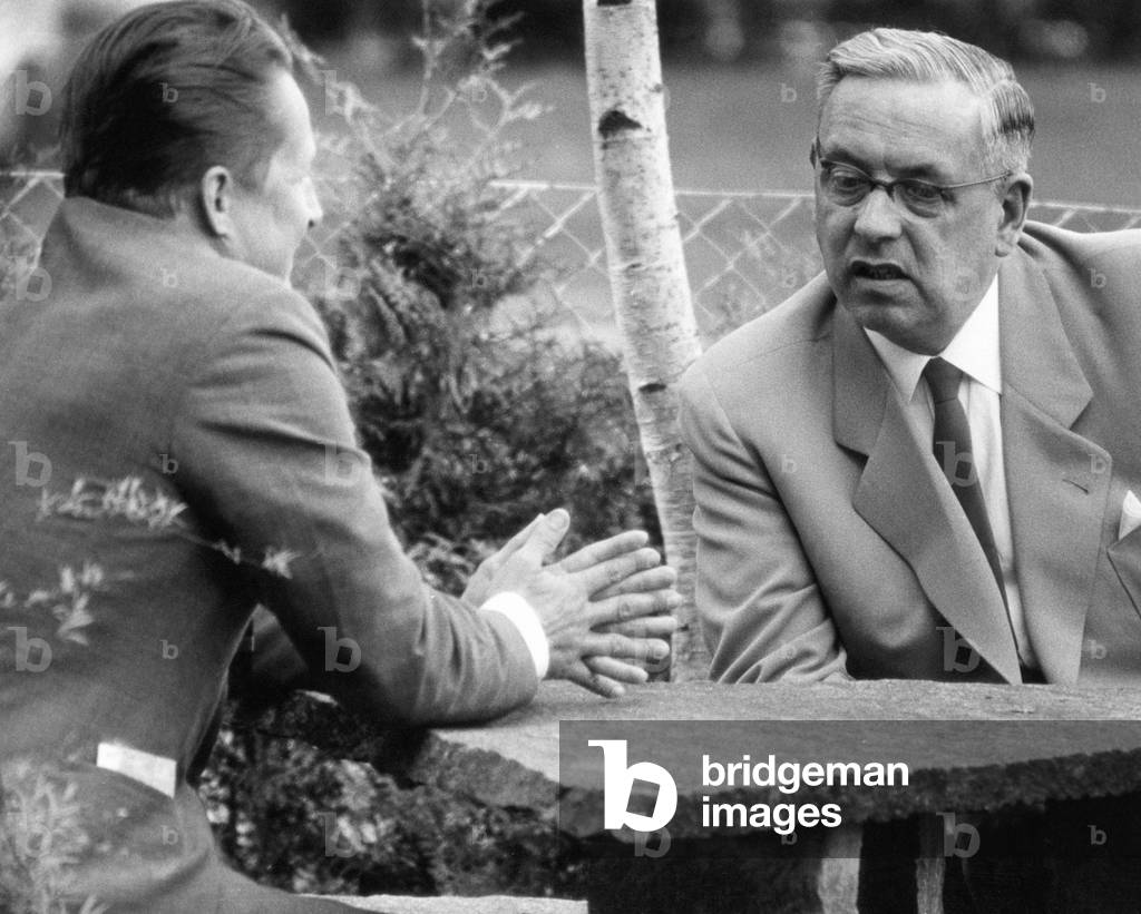 Lothar Bolz having a conversation with Ernst Laue in Geneva, 1959 (b/w photo)