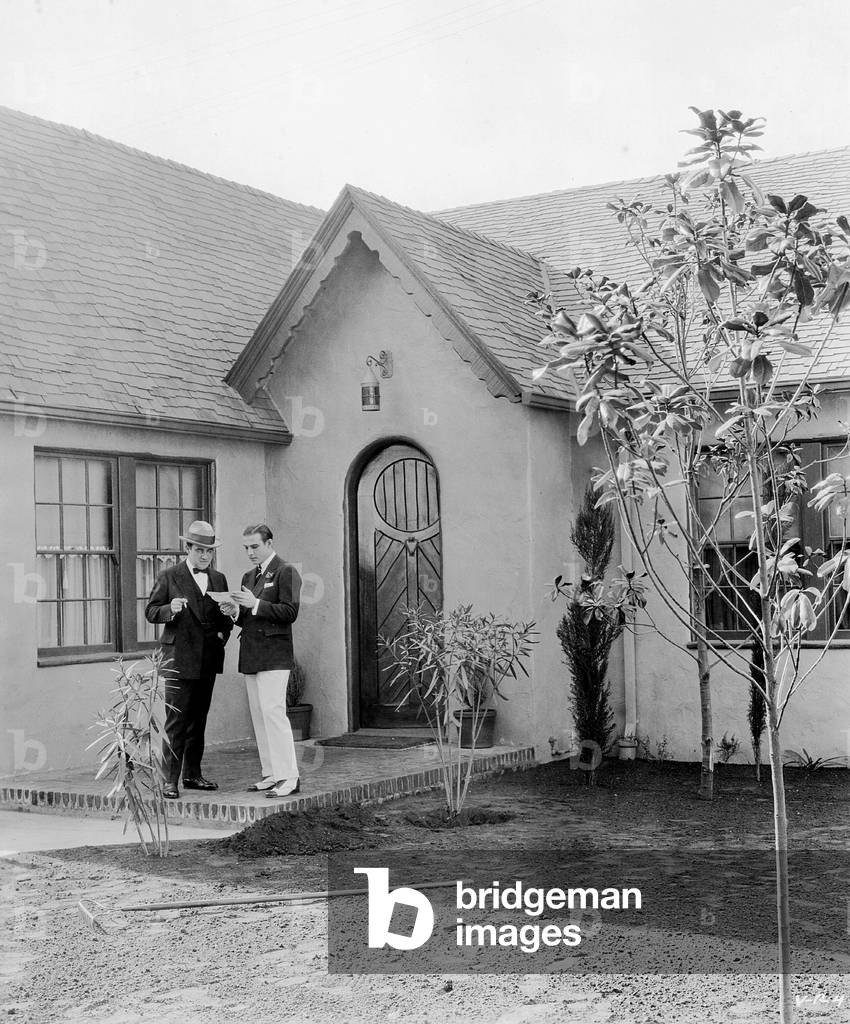 Rudolph Valentino in front of his bungalow (b/w photo)