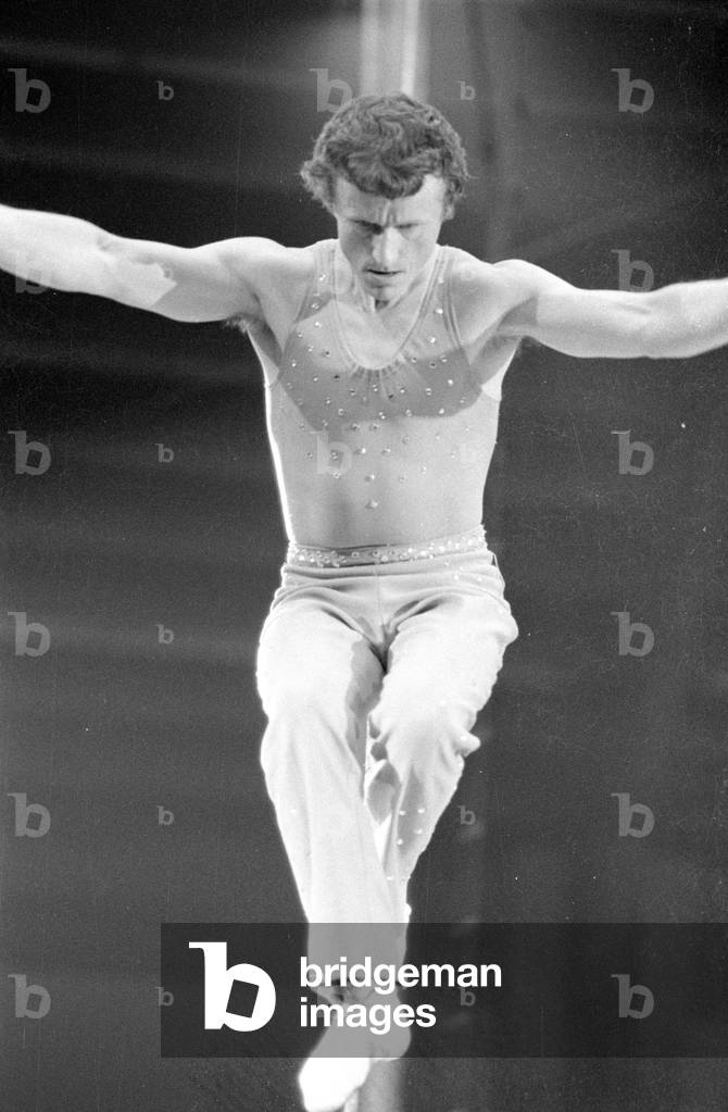 Tightrope artist in the circus, 1974 (b/w photo)