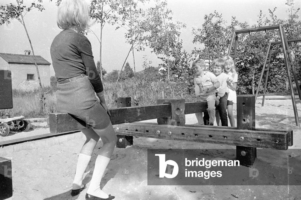 Tommi Ohrner with his siblings and his mother, 1969 (b/w photo)